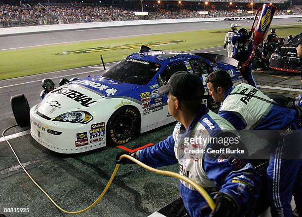 Dale Earnhardt Jr, driver of the Fastenal Chevrolet, pits during the NASCAR Nationwide Series Subway Jalapeno 250 at Daytona International Speedway...