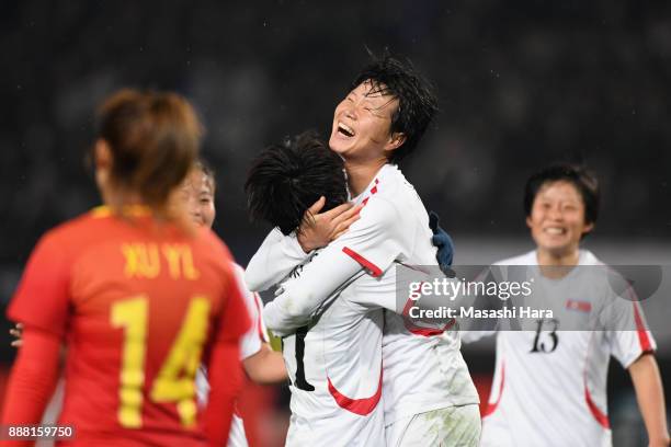 Kim Yun Mi of North Korea celebrates scoring her side's second goal with her team mates during the EAFF E-1 Women's Football Championship between...