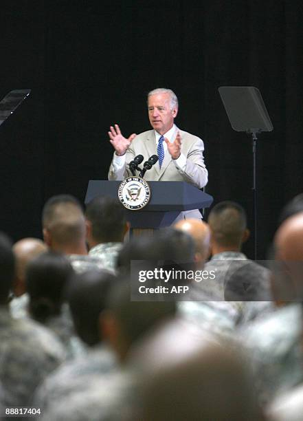 Vice President Joe Biden addresses US soldier following a US Naturalization ceremony at the al-Faw Palace, a former residence of executed Iraqi...