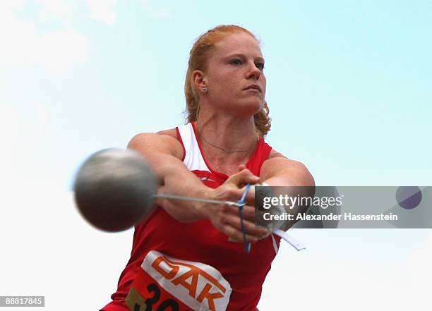 Betty Heidler competes at the women's hammer throw on day one of the German National Athletics Championships at the Donau Stadium on July 4, 2009 in...