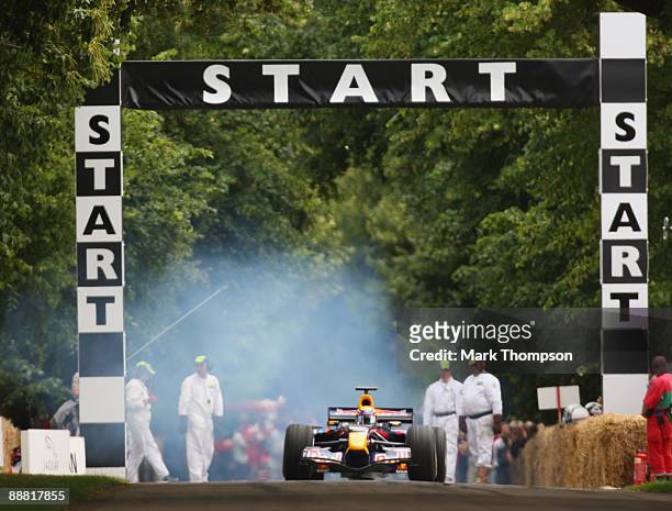 Mark Webber of Australia and Red Bull Racing in action during day two of the Goodwood Festival of Speed at the Goodwood Estate on July 4, 2009 in...