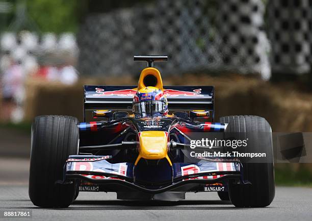 Mark Webber of Australia and Red Bull Racing in action during day two of the Goodwood Festival of Speed at the Goodwood Estate on July 4, 2009 in...