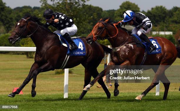 Cristophe Lemaire and Ialysos get the better of the the Adrian Nicholls ridden Masta Plasta to land The Coral Gharge Race run at Sandown Park on July...