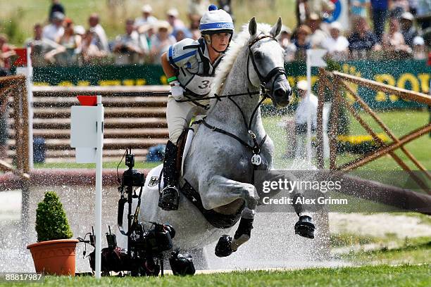 Bettina Hoy of Germany on her horse Ringwood Cockatoo in action during the Cross Country event of the CHIO on July 4, 2009 in Aachen, Germany....