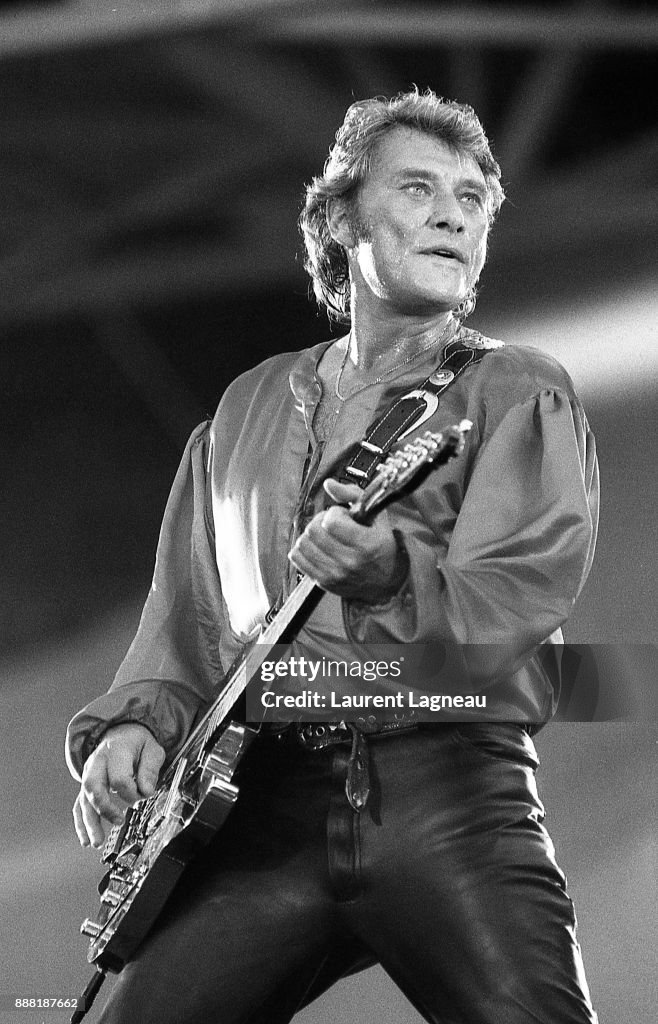Johnny Singer French singer and actor Johnny Hallyday on stage at Parc des Princes ...