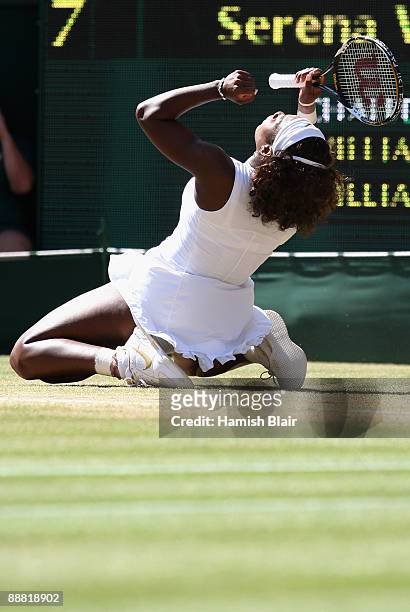 Serena Williams of USA celebrates victory during the women's singles final match against Venus Williams of USA on Day Twelve of the Wimbledon Lawn...