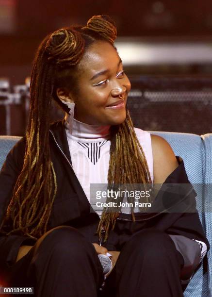 Kimberly Drew speaks onstage as part of the "Future of Art" panel discussion during the VIP Preview of BACARDI, Swizz Beatz And The Dean Collection...