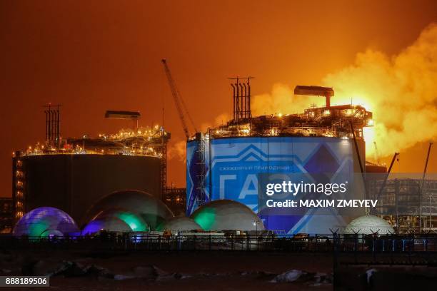 View taken on December 7, 2017 shows liquefied natural gas reservoirs in the port of Sabetta on the Kara Sea shore line on the Yamal Peninsula in the...