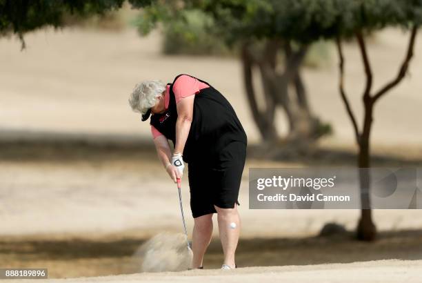 Laura Davies of England plays her second shot on the par 4, 14th hole during the third round of the 2017 Dubai Ladies Classic on the Majlis Course at...