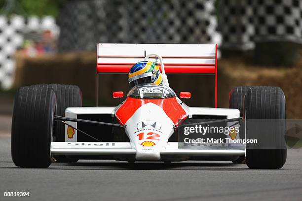 Bruno Senna of Brazil and the nephew of the former F1 legend Ayrton Senna drives his uncles world championship winning McLaren Honda MP4 during day...