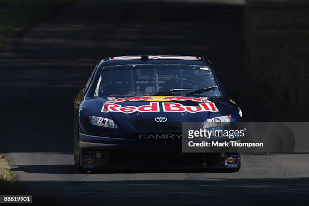 Mike Skinner of the USA and team Red Bull in action during day two of The Goodwood Festival of Speed at The Goodwood Estate on July 4, 2009 in...
