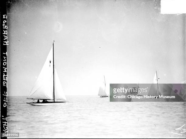 View of sailboats sailing in Lake Michigan off of Belmont Harbor, located in the Lake View community area of Chicago, Illinois, 1929.