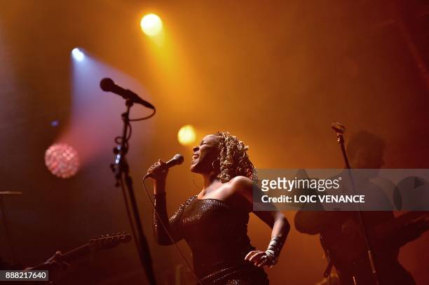 Canadian singer Tanika Charles performs on stage during the 39th edition of the Trans Musicales music festival in Saint-Jacques-de-la-Lande, outside...