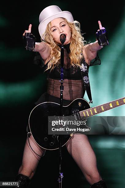 Madonna performs onstage for her 'Sticky and Sweet' tour held at the O2 Arena on July 4, 2009 in London, England.