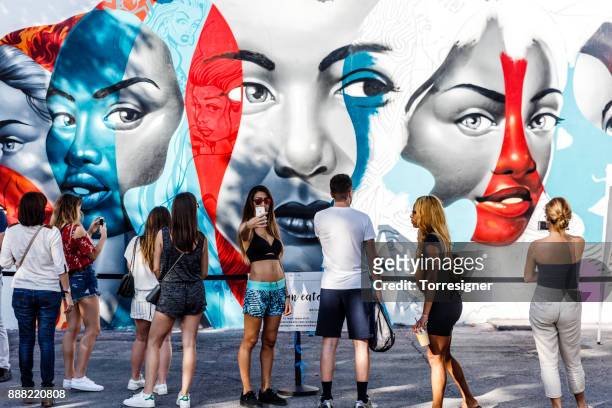wynwood art district preparing for art basel - art basel miami beach stock pictures, royalty-free photos & images