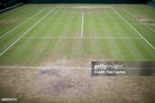 The worn baseline on Centre Court during the Wimbledon Lawn Tennis Championships at the All England Lawn Tennis and Croquet Club at Wimbledon on July...