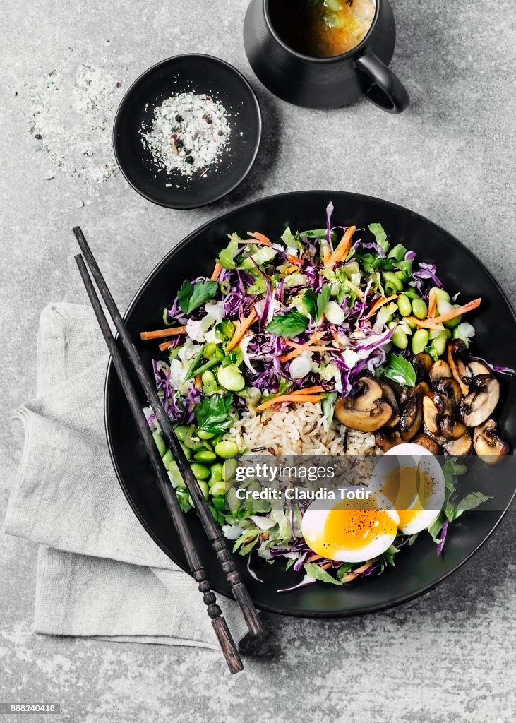 Fresh salad with fried rice and boiled eggs