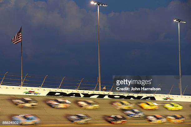 General view of cars racing during the NASCAR Sprint Cup Series 51st Annual Coke Zero 400 at Daytona International Speedway on July 4, 2009 in...