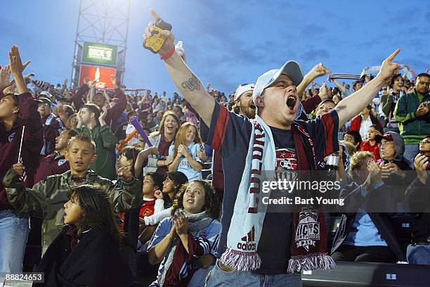 Fans of the Colorado Rapids celebrate during the Colorado Rapids v the Chicago Fire on July 4, 2009 at Dicks Sporting Goods Park in Commerce City,...