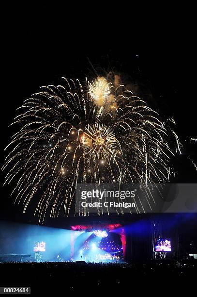 Fireworks are displayed over the ODEUM for Independence Day as The Dead perform during Day 3 of the 2009 Rothbury Music Festival on July 4, 2009 in...