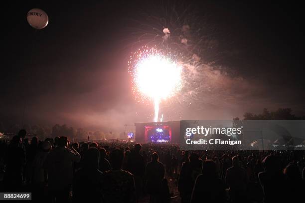 Fireworks are displayed over the ODEUM for Independence Day as The Dead perform during Day 3 of the 2009 Rothbury Music Festival on July 4, 2009 in...