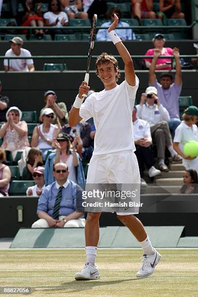 Andrey Kuznetsov of Russia celebrates victory after the boy's singles final match against Jordan Cox of USA on Day Thirteen of the Wimbledon Lawn...