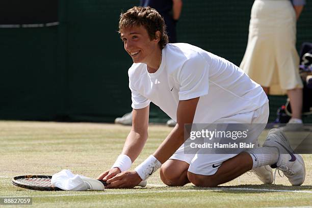 Andrey Kuznetsov of Russia celebrates victory after the boy's singles final match against Jordan Cox of USA on Day Thirteen of the Wimbledon Lawn...