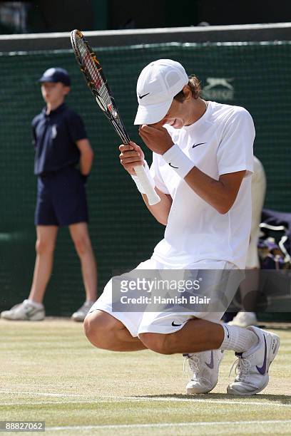 Andrey Kuznetsov of Russia celebrates victory after the boy's singles final match against Jordan Cox of USA on Day Thirteen of the Wimbledon Lawn...