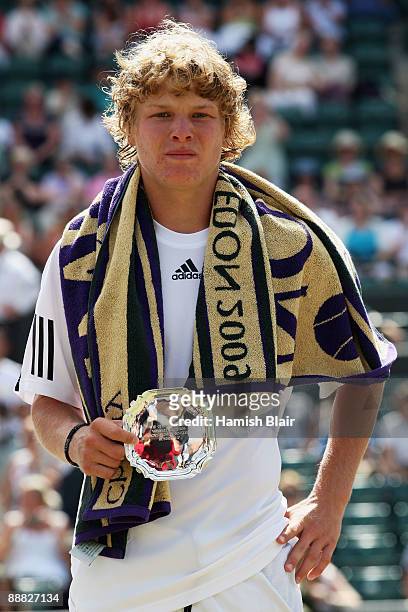 Runner up Jordan Cox of USA poses after the boy's singles final match against Andrey Kuznetsov of Russia on Day Thirteen of the Wimbledon Lawn Tennis...