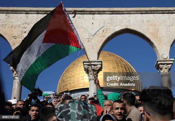 Muslim worshipers gathering to perform the first Friday Prayer at al-Aqsa Mosque compound after U.S. President Donald Trumps announcement to...