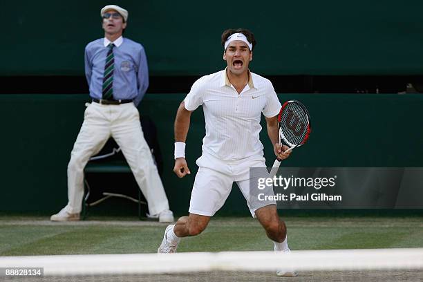 Roger Federer of Switzerland celebrates victory during the men's singles final match against Andy Roddick of USA on Day Thirteen of the Wimbledon...