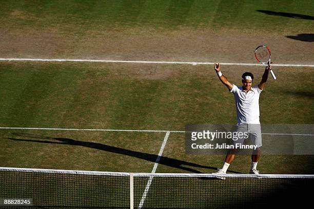 Roger Federer of Switzerland celebrates victory during the men's singles final match against Andy Roddick of USA on Day Thirteen of the Wimbledon...