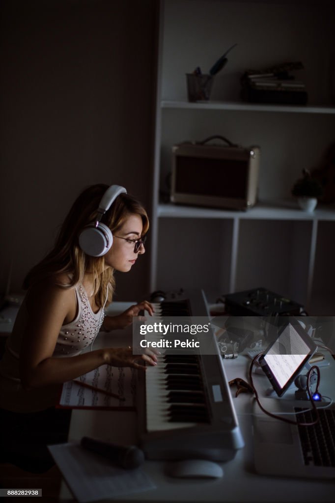 Creative Young Woman Making Music