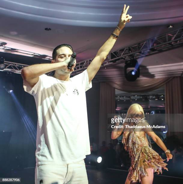 Eazy and Cardi B at Eden Roc Hotel on December 7, 2017 in Miami Beach, Florida.