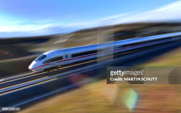 Special ICE high speed train of German railway operator Deusche Bahn drives near Erfurt, eastern Germany, heading for Berlin on a new fast route to...