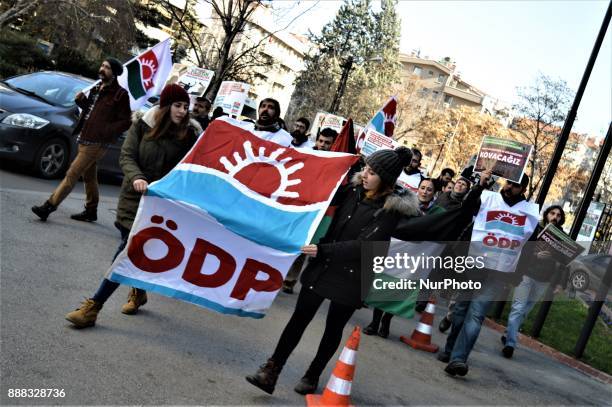 Photo taken in Ankara, Turkey on December 8, 2017 shows that leftists take part in a protest near the U.S. Embassy against its president Donald...