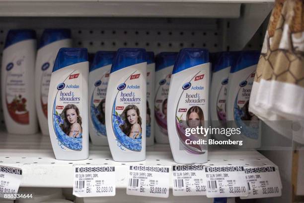 Bottles of "hoed & shouders" shampoo sit on display for sale at a grocery store in Caracas, Venezuela, on Tuesday, Nov. 28, 2017. 28th, 2017. In...