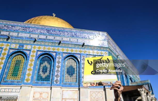 Muslim worshipers gathering to perform the first Friday Prayer at al-Aqsa Mosque compound after U.S. President Donald Trumps announcement to...