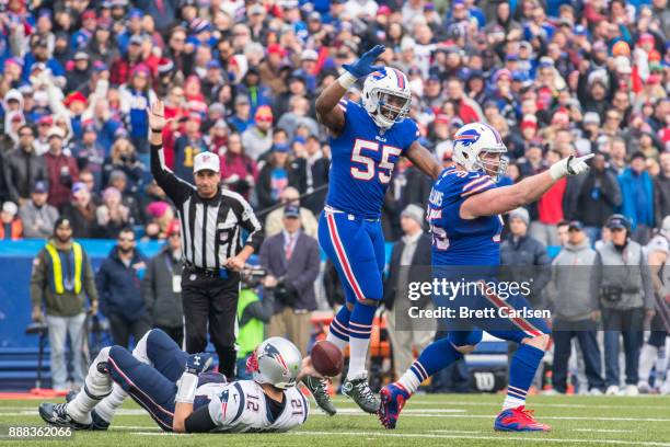 Kyle Williams of the Buffalo Bills celebrates a sack against Tom Brady of the New England Patriots during the second quarter at New Era Field on...