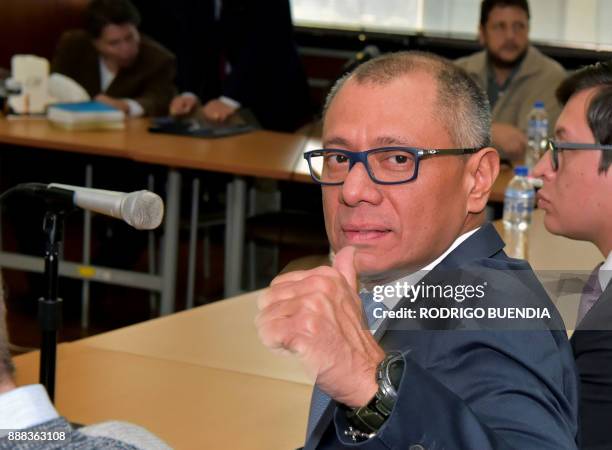 Ecuador's vice president Jorge Glas gives his thumb up before the start of his hearing at the court in Quito, on December 8, 2017. Ecuadorean...