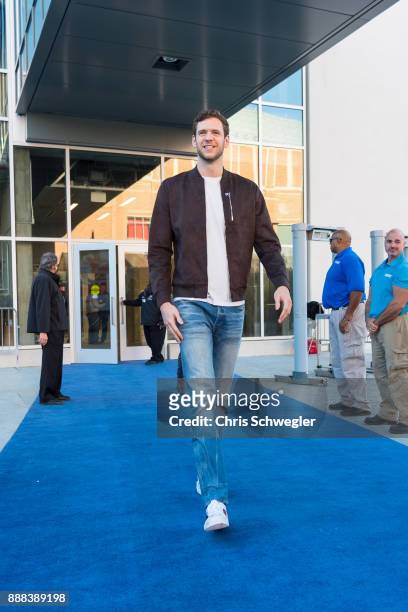 Jon Leuer of the Detroit Pistons arrives before the game against the Charlotte Hornets on October 18, 2017 at Little Caesars Arena in Detroit,...