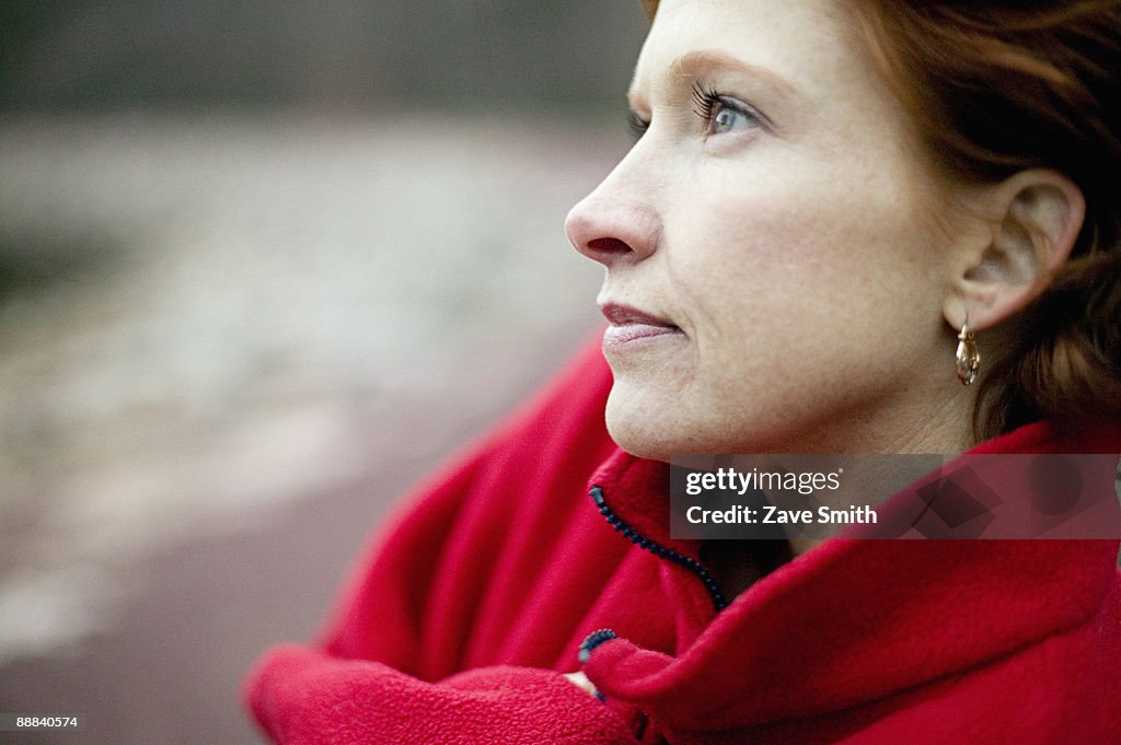 Pensive woman outdoors