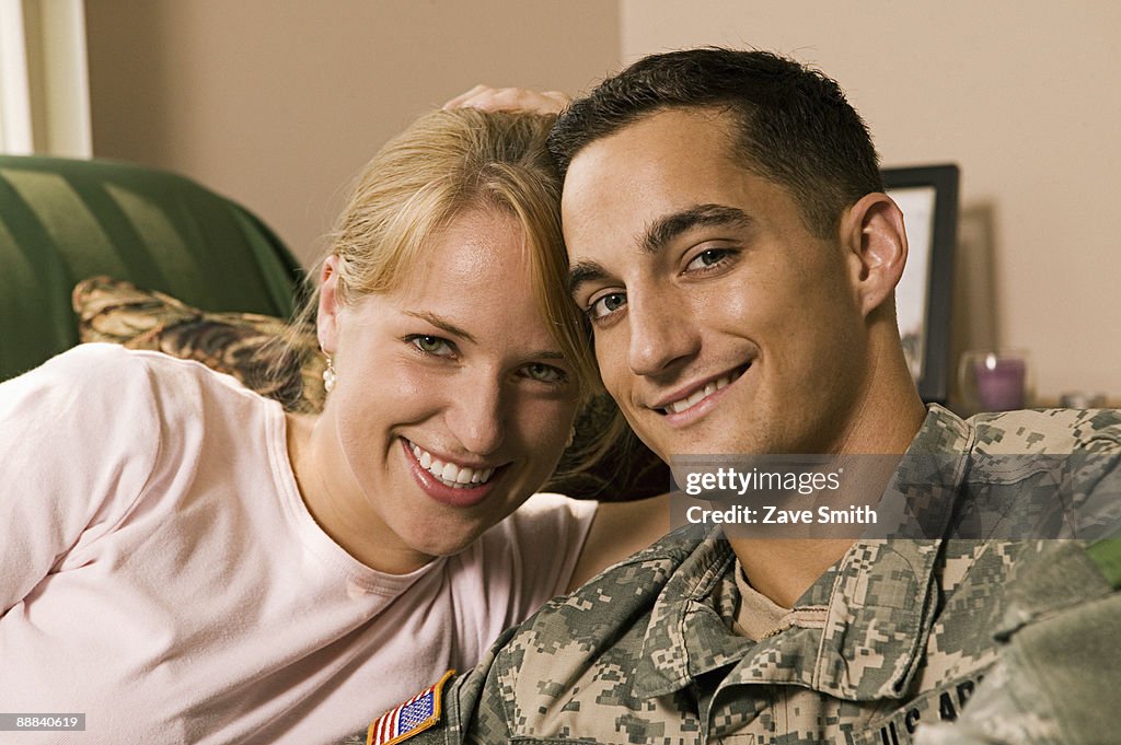 Woman with soldier at home