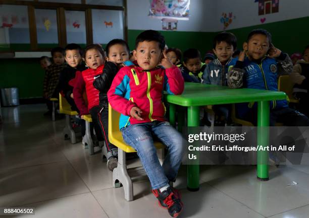 Salar ethnic minority children in a school, Qinghai province, Xunhua, China on October 26, 2017 in Xunhua, China.