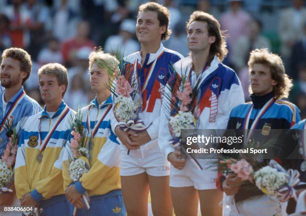 The medal winners in the Men's Doubles tennis event line up during the medal ceremony, Miloslav Mecir of Czechoslovakia , Anders Jarryd and Stefan...