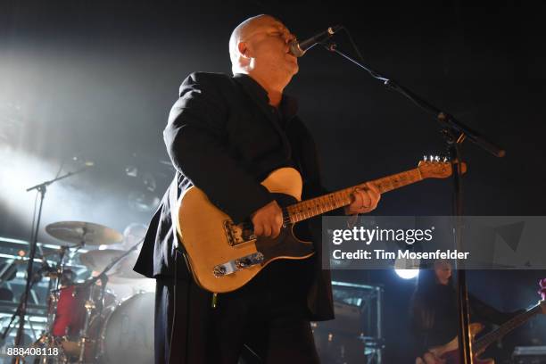 Black Francis and Paz Lenchantin of Pixies perform at the Fox Theater on December 7, 2017 in Oakland, California.