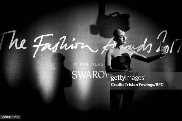 Hailey Baldwin takes a selfie as she attends The Fashion Awards 2017 in partnership with Swarovski at Royal Albert Hall on December 4, 2017 in...