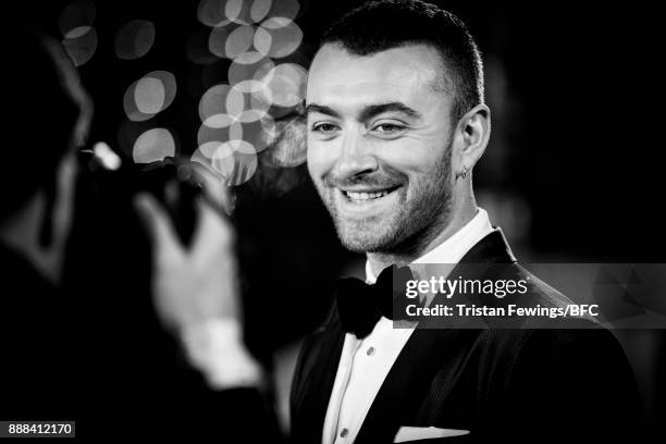 Singer Sam Smith walks the red carpet during The Fashion Awards 2017 in partnership with Swarovski at Royal Albert Hall on December 4, 2017 in...