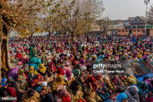 Kashmiri Muslim women devotees pray at Hazratbal shrine on the Friday following, Eid-e-Milad , or the birth anniversary of Prophet Mohammad on...