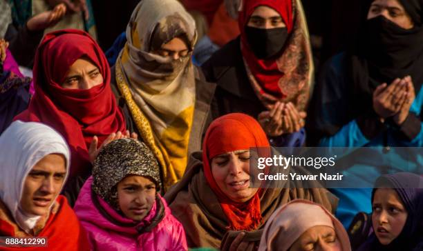 Kashmiri Muslim women devotees pray at Hazratbal shrine on the Friday following, Eid-e-Milad , or the birth anniversary of Prophet Mohammad on...